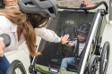 Przyczepka rowerowa dla dziecka, podwójna - THULE Chariot Cab 2 - oliwkowa/szara Przyczepka rowerowa dla dziecka, podwójna - THULE Chariot Cab 2 - oliwkowa/szara